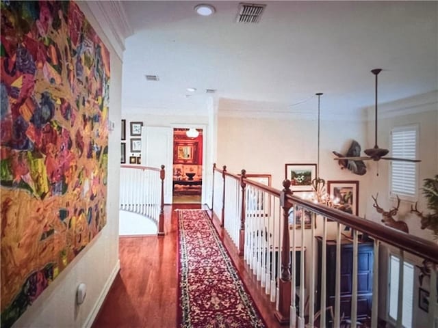 4502 Thoreau Cir, Corpus Christi, TX 78410 - corridor featuring ornamental molding, wood finished floors, an upstairs landing, and recessed lighting