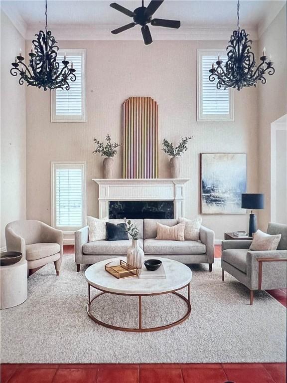4502 Thoreau Cir, Corpus Christi, TX 78410 - living area featuring a chandelier, healthy amount of natural light, a premium fireplace, and ornamental molding