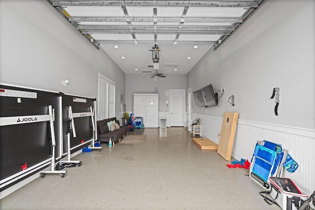 125 Reserve Ln, Rockport, TX 78382 - garage with wainscoting and recessed lighting