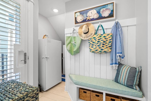 125 Reserve Ln, Rockport, TX 78382 - mudroom with vaulted ceiling and light tile patterned floors