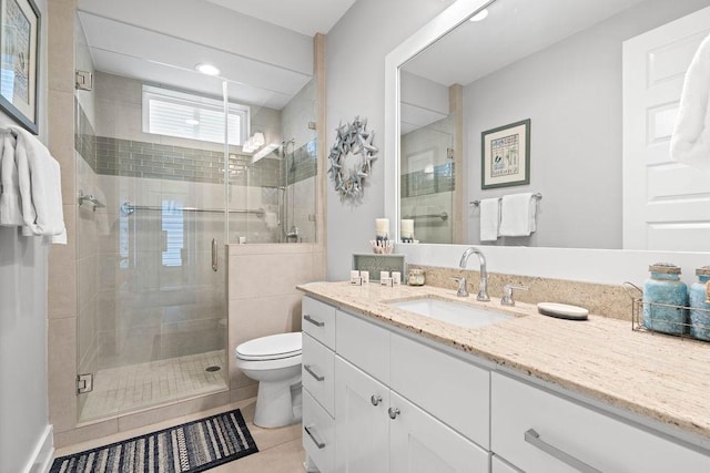 125 Reserve Ln, Rockport, TX 78382 - full bathroom featuring vanity, a stall shower, and tile patterned floors