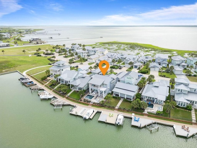 125 Reserve Ln, Rockport, TX 78382 - aerial view of residential area featuring a nearby body of water