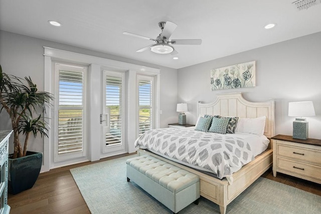 125 Reserve Ln, Rockport, TX 78382 - bedroom featuring access to outside, dark wood-style floors, recessed lighting, and a ceiling fan