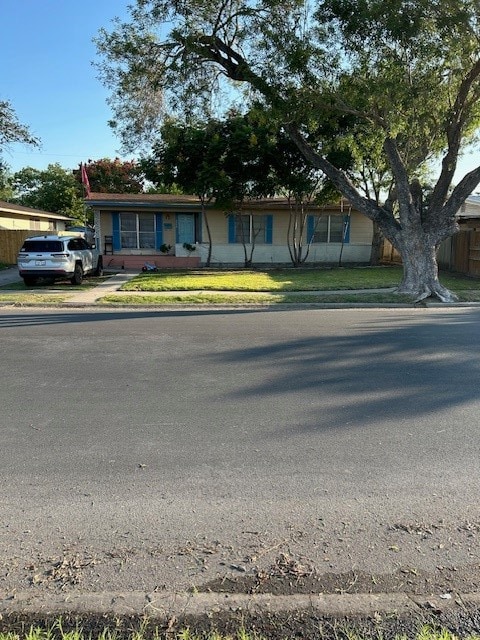 view of front of property with a front lawn