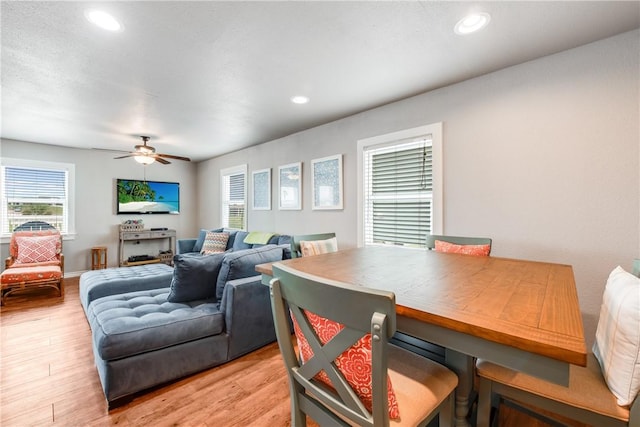 dining room with ceiling fan, light wood-style flooring, and recessed lighting