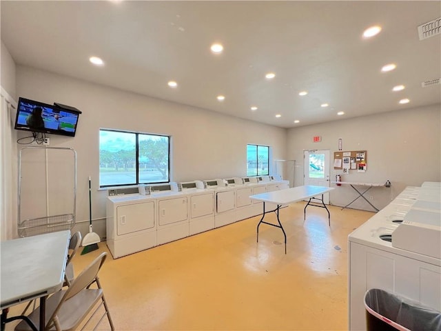 11 Augusta Cir, Aransas Pass, TX 78336 - kitchen with independent washer and dryer, open floor plan, recessed lighting, healthy amount of natural light, and concrete floors