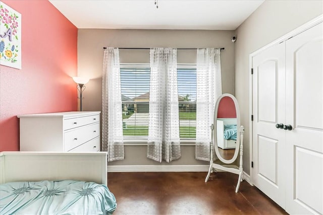 7237 Lake Tranquility Dr, Corpus Christi, TX 78414 - bedroom with concrete flooring and baseboards