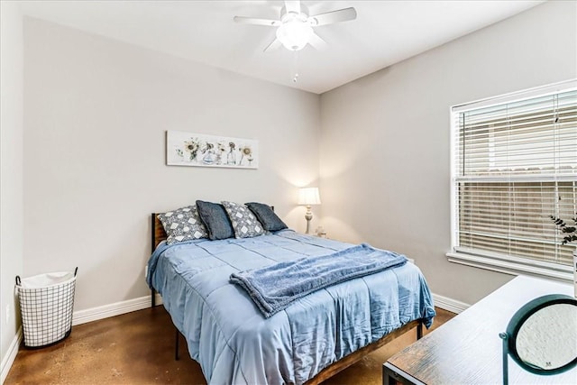 7237 Lake Tranquility Dr, Corpus Christi, TX 78414 - bedroom with ceiling fan, baseboards, and finished concrete floors