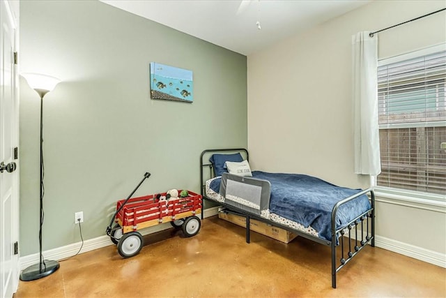 7237 Lake Tranquility Dr, Corpus Christi, TX 78414 - bedroom with finished concrete flooring and baseboards