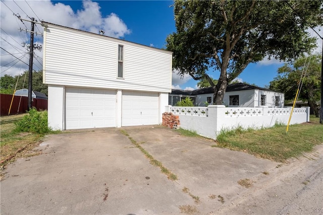 exterior space featuring a garage