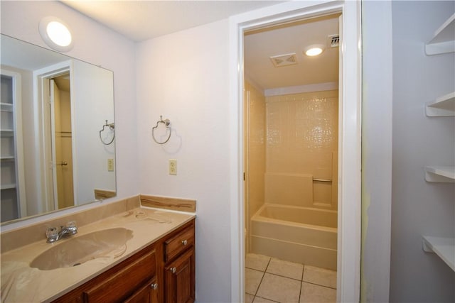 bathroom featuring tile patterned floors and vanity