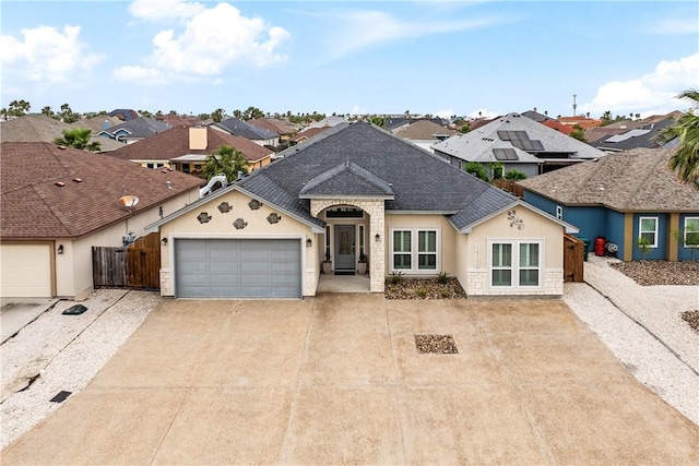 14150 Coquina Bay Ave, Corpus Christi, TX 78418 - ranch-style house featuring an attached garage, stone siding, stucco siding, concrete driveway, and a shingled roof
