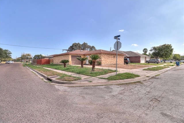 ranch-style home with a garage