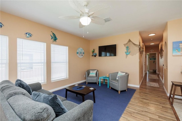 112 Tropical Breeze Ln, Aransas Pass, TX 78336 - living room with light wood-style flooring and ceiling fan