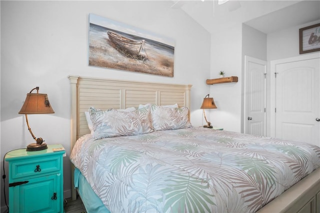 bedroom featuring lofted ceiling