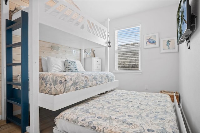 bedroom featuring wood finished floors