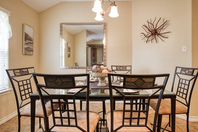 214 Palmer Dr, Portland, TX 78374 - dining space with baseboards, an inviting chandelier, light tile patterned floors, and vaulted ceiling
