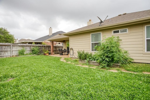 214 Palmer Dr, Portland, TX 78374 - back of property with a lawn, a patio, and fence