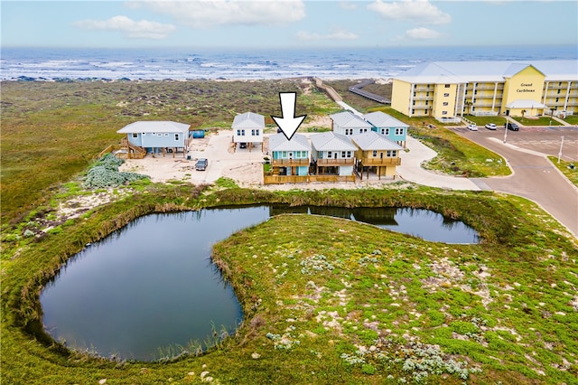 drone / aerial view with a water view