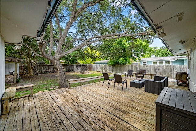 622 Bermuda Pl, Corpus Christi, TX 78411 - wooden deck with an outdoor hangout area and a fenced backyard
