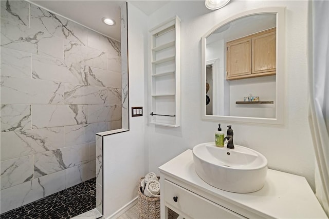 622 Bermuda Pl, Corpus Christi, TX 78411 - bathroom featuring a walk in shower, vanity, and recessed lighting