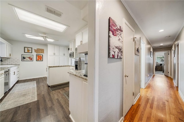 622 Bermuda Pl, Corpus Christi, TX 78411 - hall with dark wood-style floors, crown molding, and recessed lighting