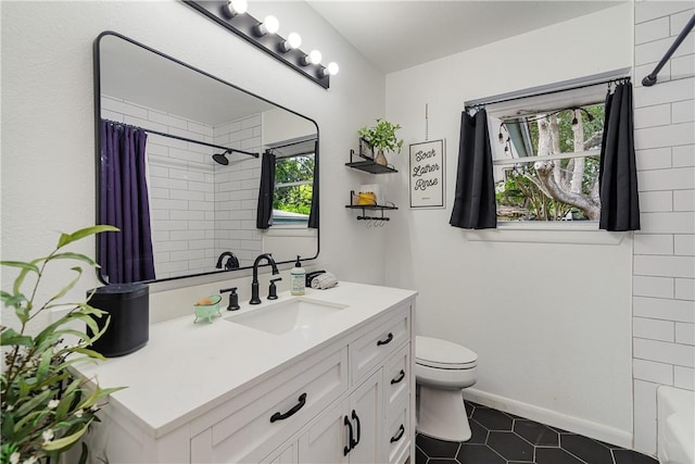 622 Bermuda Pl, Corpus Christi, TX 78411 - bathroom featuring vanity, tile patterned flooring, and shower / bath combo with shower curtain