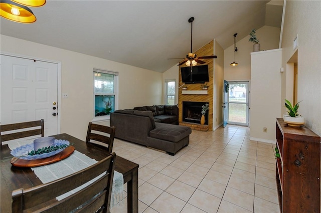 7202 Mansions Dr Unit N1, Corpus Christi, TX 78414 - dining area featuring light tile patterned floors, high vaulted ceiling, a ceiling fan, and a brick fireplace