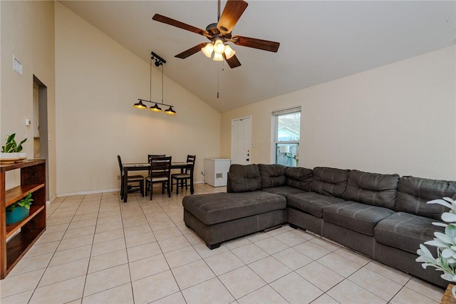 7202 Mansions Dr Unit N1, Corpus Christi, TX 78414 - living room with high vaulted ceiling, a ceiling fan, light tile patterned floors, baseboards, and visible vents
