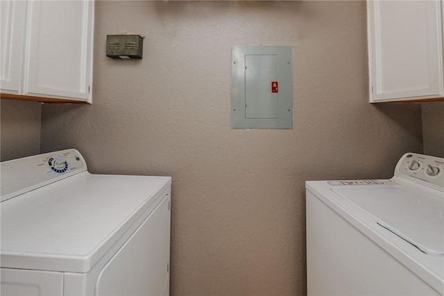 7202 Mansions Dr Unit N1, Corpus Christi, TX 78414 - clothes washing area with cabinet space, a textured wall, electric panel, and washer and dryer