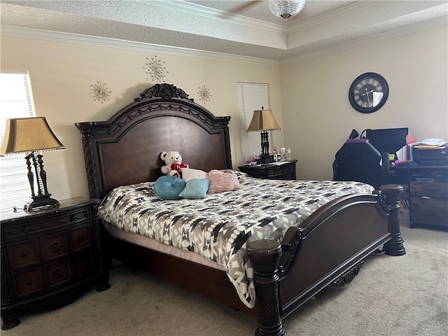 carpeted bedroom with ceiling fan, a textured ceiling, and ornamental molding