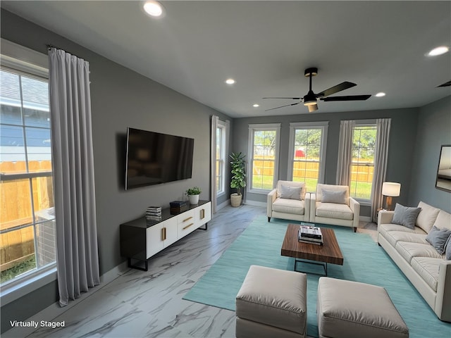 living room with ceiling fan