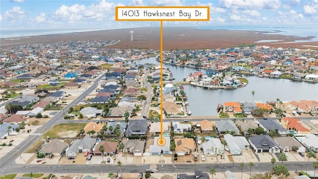 14013 Hawksnest Bay Dr, Corpus Christi, TX 78418 - aerial view of property and surrounding area featuring nearby suburban area and a nearby body of water