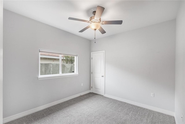 14013 Hawksnest Bay Dr, Corpus Christi, TX 78418 - carpeted empty room featuring a ceiling fan and baseboards