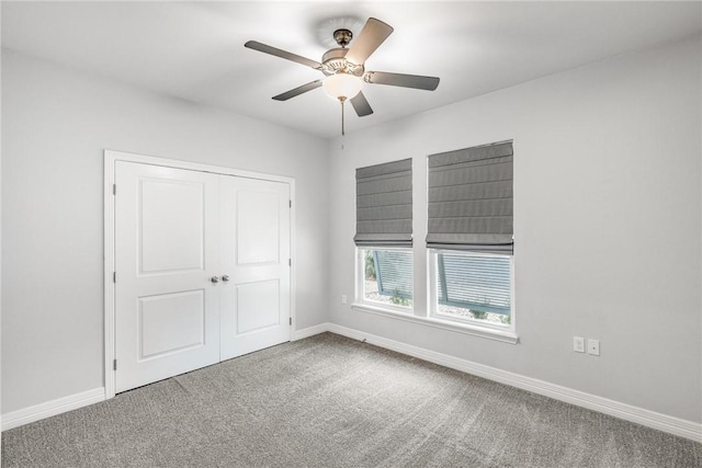 14013 Hawksnest Bay Dr, Corpus Christi, TX 78418 - unfurnished bedroom featuring carpet floors, a closet, and ceiling fan