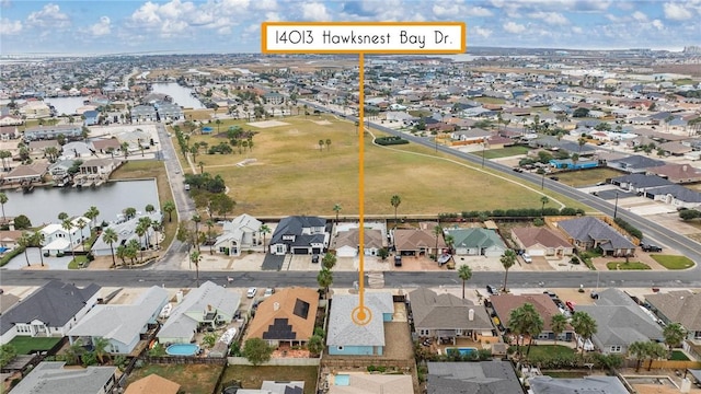 14013 Hawksnest Bay Dr, Corpus Christi, TX 78418 - aerial overview of property's location featuring nearby suburban area and a nearby body of water