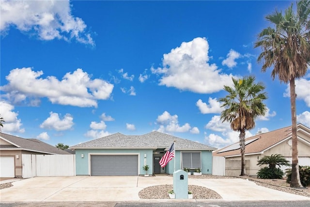 14013 Hawksnest Bay Dr, Corpus Christi, TX 78418 - single story home featuring stucco siding, concrete driveway, and an attached garage