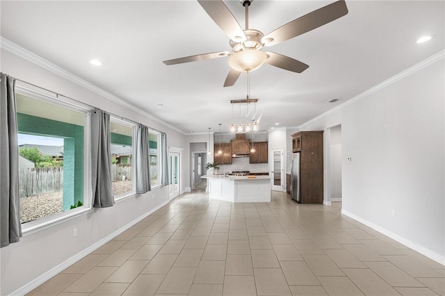 14013 Hawksnest Bay Dr, Corpus Christi, TX 78418 - unfurnished living room featuring ornamental molding, a ceiling fan, recessed lighting, and light tile patterned floors