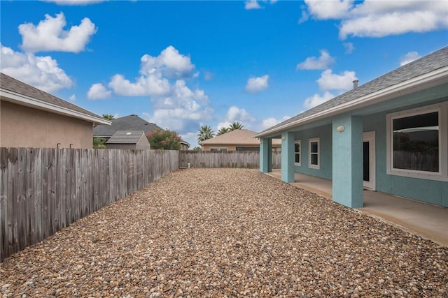 14013 Hawksnest Bay Dr, Corpus Christi, TX 78418 - fenced backyard with a patio