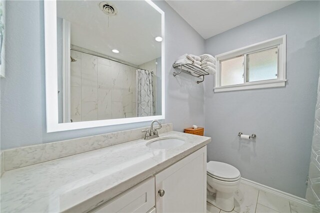 438 Pennington Dr, Corpus Christi, TX 78412 - bathroom featuring vanity, toilet, marble finish flooring, baseboards, and a shower with shower curtain