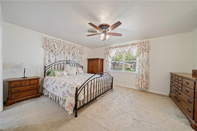 438 Pennington Dr, Corpus Christi, TX 78412 - bedroom with light carpet, a ceiling fan, and baseboards
