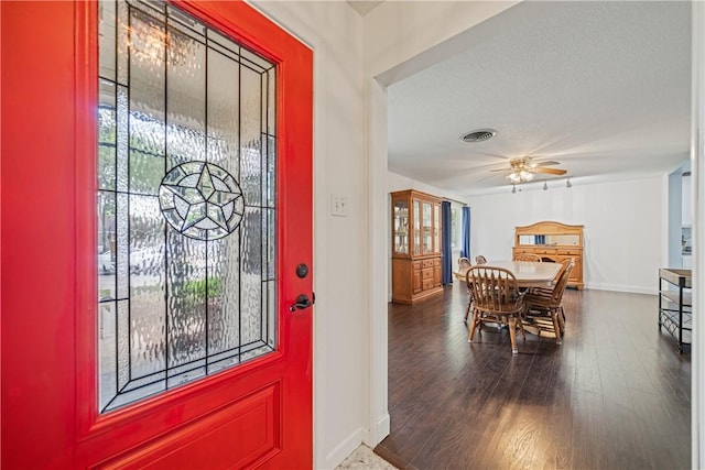 438 Pennington Dr, Corpus Christi, TX 78412 - foyer entrance with baseboards, ceiling fan, wood finished floors, and a textured ceiling