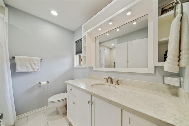 438 Pennington Dr, Corpus Christi, TX 78412 - full bath with vanity, toilet, recessed lighting, marble look tile flooring, and curtained shower
