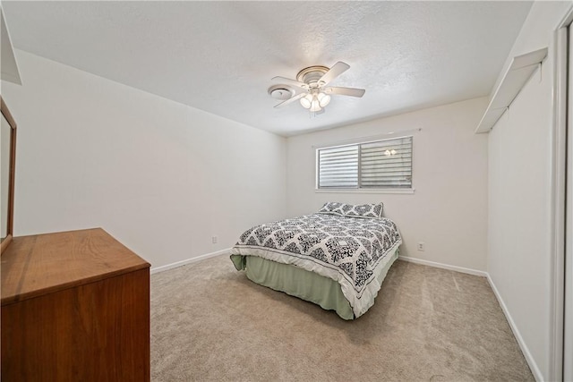 438 Pennington Dr, Corpus Christi, TX 78412 - carpeted bedroom featuring baseboards and a ceiling fan