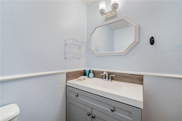 438 Pennington Dr, Corpus Christi, TX 78412 - bathroom featuring vanity and toilet