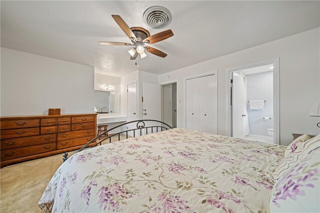 438 Pennington Dr, Corpus Christi, TX 78412 - bedroom with carpet floors, ensuite bathroom, ceiling fan, and a closet
