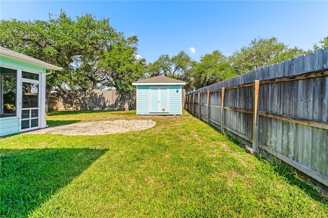 215 Sandollar Cir, Fulton, TX 78358 - view of yard with a shed, an outbuilding, and a patio