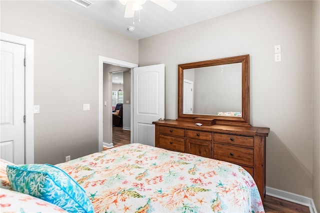 215 Sandollar Cir, Fulton, TX 78358 - bedroom with wood finished floors, baseboards, and a ceiling fan