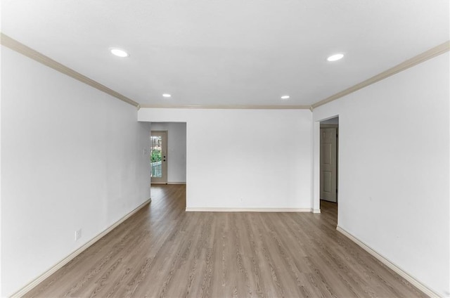 1122 Dorthy Dr, Corpus Christi, TX 78412 - unfurnished room featuring crown molding, light wood-type flooring, and recessed lighting
