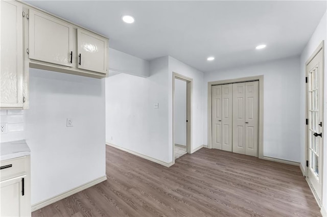 1122 Dorthy Dr, Corpus Christi, TX 78412 - kitchen with light wood-style flooring, recessed lighting, baseboards, light countertops, and tasteful backsplash